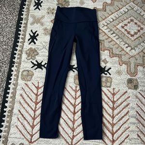 lululemon leggings. size 4. navy with mesh detail.